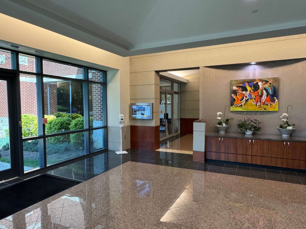 Pedro Sauer Academy: Building Foyer and Entrance, 510 Spring Street Herndon, VA. - Pedro Sauer Academy - Pedro Sauer Academy Building foyer at 510 Spring Street Herndon VA 20170 with Pedro Sauer Academy of Self-Defense entrance visible.