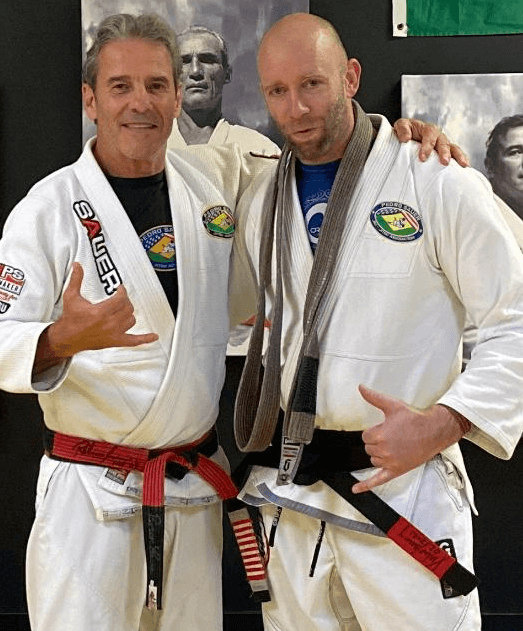 Gustave Anderly Receives Brazilian Jiu-Jitsu (BJJ) Black Belt from Professor Pedro Sauer - Pedro Sauer Academy - Pedro Sauer Academy Professor Pedro Sauer congratulates Gustave Anderly after promoting him to Brazilian Jiu-Jitsu black belt in 2021.